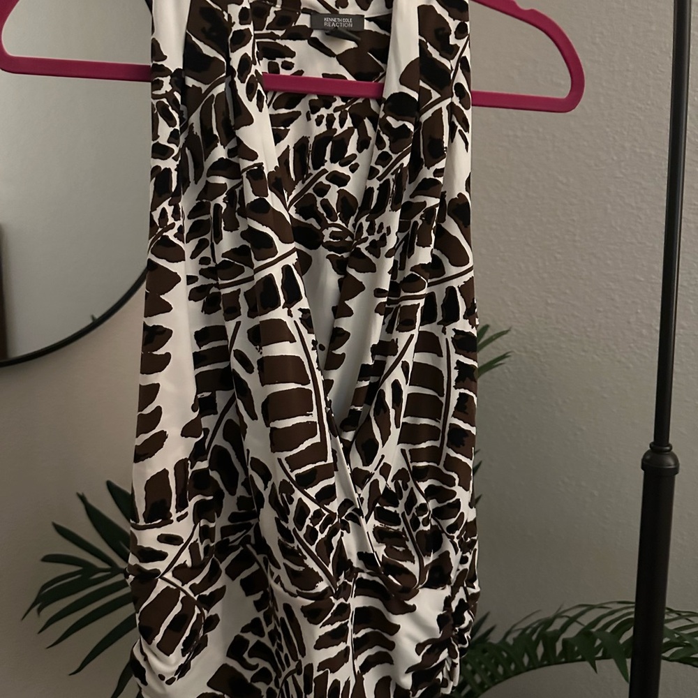 Sleeveless brown and white top